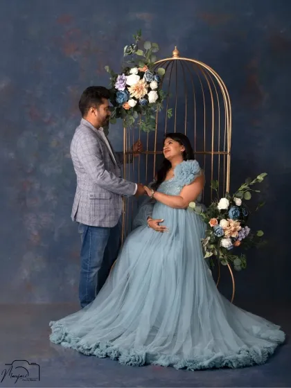 A moment of pure connection. The couple holds hands, their loving gaze telling a story of shared dreams and excitement for their new journey together.