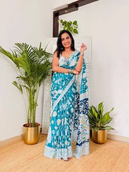 A lovely teal blue Kalamkari print saree. The color is so soothing, and the soft cotton Mulmul fabric makes it a dream to wear.
