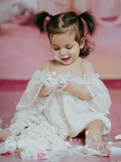 Let them make a mess. A first birthday cake smash is all about fun, and I’m here to catch every frosting-covered giggle and happy moment. This is a celebration of a whole year of sweetness.