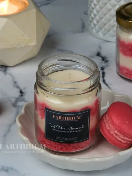My Red Velvet Cheesecake candle, layered to look just like the classic dessert, complete with a macaron on the side.