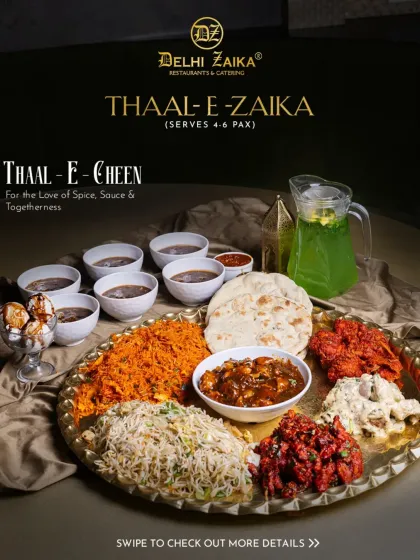 The full spread of our Thaal-E-Cheen, a celebration of spice, sauce, and togetherness. It's the best of both worlds, served on a grand platter.
