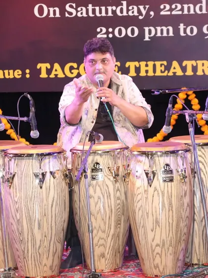 The great Nitin Shankar ji leading his percussion ensemble at the Ustad Alla Rakha Sangeet Sammelan. I am on the left, playing tabla as part of this powerful rhythmic story.
