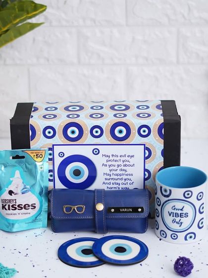 This Evil Eye Hamper is a unique and thoughtful gift. The mug can be customized with a photo, and the eyewear case can be personalized with a name.