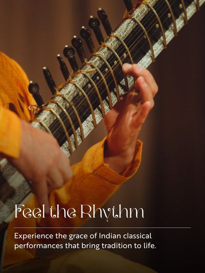 "Feel the Rhythm." A close-up of hands playing the sitar, this image beautifully represents the grace and tradition of the Indian classical performances we host.