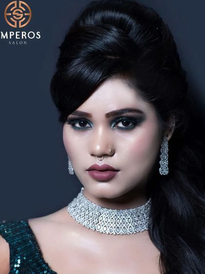 A bold and dramatic look. This client pairs a smokey eye with our wide, intricate diamond-look choker and matching earrings for a high-fashion statement.