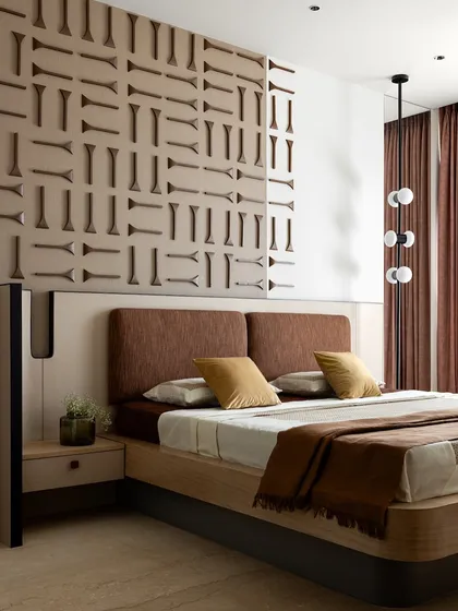 The son's bedroom, where the custom 3D wooden wall panel serves as a stunning headboard. The earthy tones and minimalist forms create a space that is both youthful and sophisticated.
