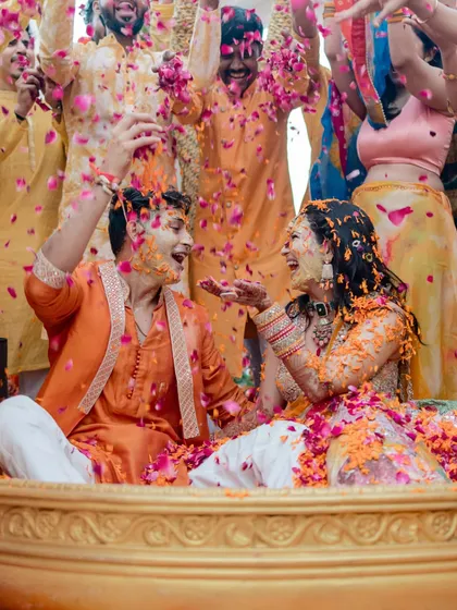 The Haldi ceremony is a beautiful chaos of color and laughter. We capture the fun and playful energy, freezing these moments of pure, unscripted fun between the couple and their loved ones.