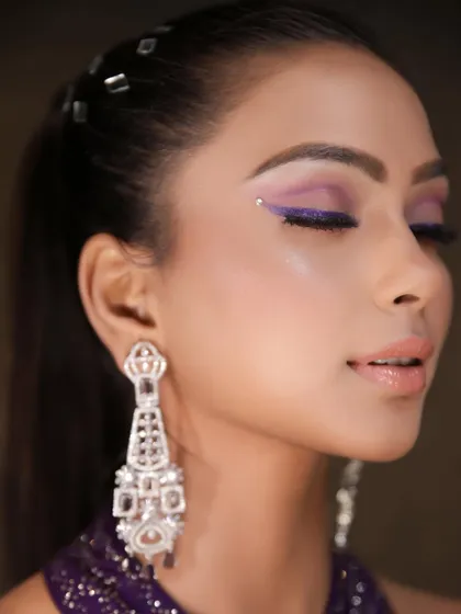 Another detailed shot of the purple winged liner, this time with a tiny Swarovski crystal at the end for an extra touch of sparkle. It is all in the details.
