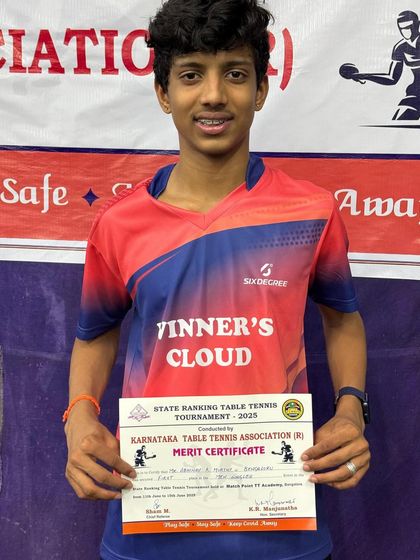 Abhinav Murthy with his merit certificate after winning a double title in the Men's singles and U19 singles at a Karnataka state ranking tournament.