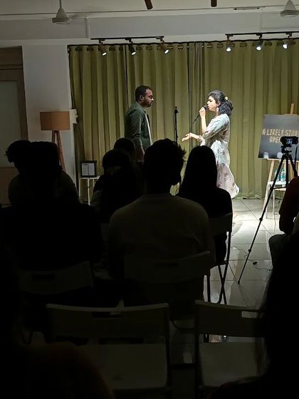 A storyteller holds the room captive. Our stage is set up to create an intimate connection between the artist and the audience, making every performance feel personal.