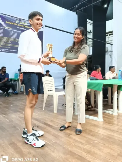 Anmol receiving one of his championship trophies. We focus on developing a winning mindset that helps our players perform under pressure.