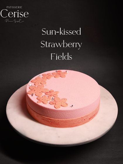Sun-kissed Strawberry Fields. This pink-hued entremet is soft, sweet, and captures the essence of a perfect summer afternoon.