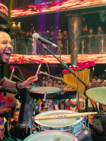 The energy in Kathmandu was electric. This shot captures me in my element during a live club performance, connecting with the crowd and pouring all my passion into the music.