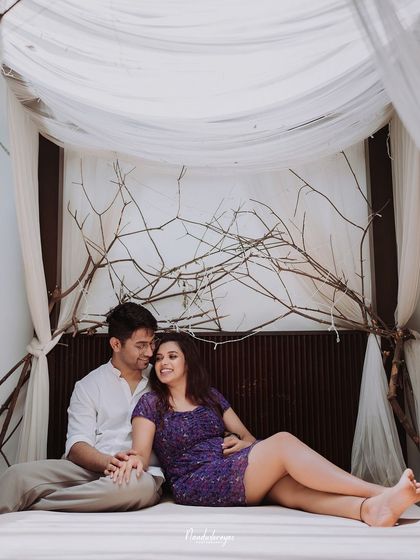 A relaxed and romantic pose on our indoor bed set with its whimsical branch and curtain canopy.