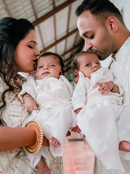The pure joy of family. We capture precious moments like this one with newborn twins, creating timeless portraits that celebrate your family's new chapter.