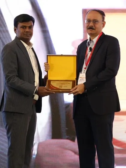 A moment of recognition as our Founder & CIO, Anil Rego, receives an award at an investment conference. This underscores our leadership and expertise within the financial services industry.