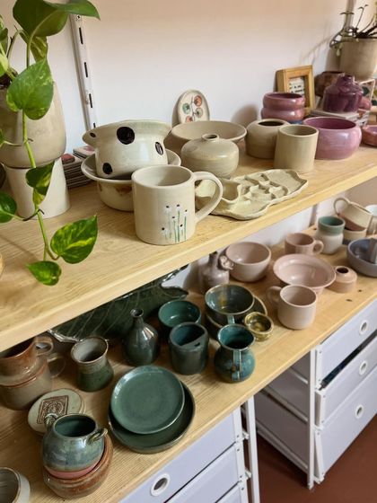 Shelves loaded with freshly glazed student work, ready to be fired in the kiln. The anticipation of seeing how they turn out is always so exciting.