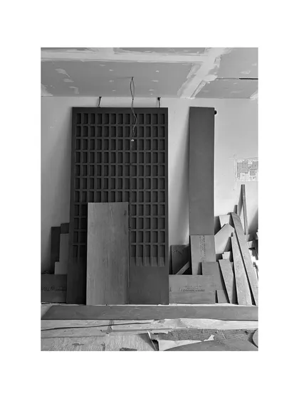 A quiet moment on a busy site. This CNC-cut panel is waiting to be installed, surrounded by the raw materials that will soon become a beautiful home.