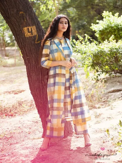 This shot captures the essence of my approach to fashion photography. I used the soft, natural light of an outdoor setting to highlight the flow and vibrant pattern of this plaid co-ord set from Taavi's collection for Myntra. The relaxed pose feels authentic and lets the outfit's personality shine through, creating an image that is both a lifestyle statement and a clear product showcase.
