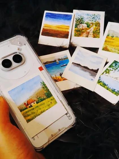 Here’s a fun way I love to use my mini watercolor Polaroids. They are the perfect size to slip into a clear phone case, letting you carry a tiny piece of original art with you everywhere you go.