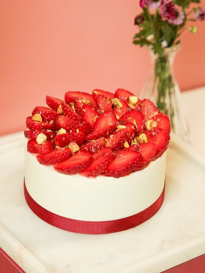 Another angle of our beautiful Strawberry Gateau, showcasing the generous topping of fresh strawberries.