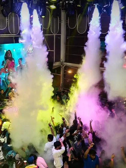 An epic shot of the CO2 cannons firing over the crowd, perfectly synced with the VJ screen.