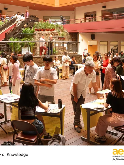 We prepare students for university-level thinking through unique academic events like the Theory of Knowledge (TOK) Exhibition. Here, students present their research to the community, demonstrating the critical thinking and intellectual curiosity that top universities look for in applicants.
