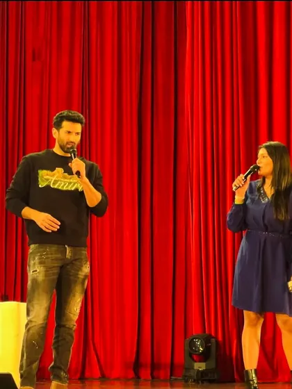 A moment on stage with Bollywood heartthrob Aditya Roy Kapur at IIT Bombay's Mood Indigo. I ensure a comfortable and engaging atmosphere for celebrity appearances.