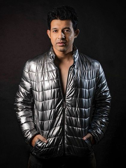 A more stylized, fashion-forward shot. I enjoy expressing myself through different looks, just like I do with different genres of music.