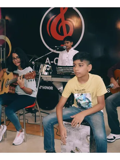 A full band jam session right here at the academy. Students on keyboard, guitar, and cajon are learning to sync up and create music together. These sessions are a regular part of our curriculum.