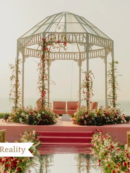 This is what we mean by 'render to reality'. We designed this elegant glasshouse mandap by the sea, and the final result was a picture-perfect setting for our couple to say their vows.