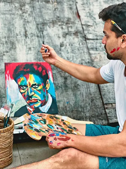 A focused moment during a painting session. I believe in the power of losing yourself in your art, and I strive to create a space where you can do just that.