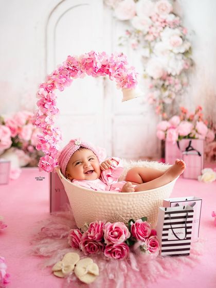 Having a blast in her floral bathtub! This baby's joyful expression is priceless.