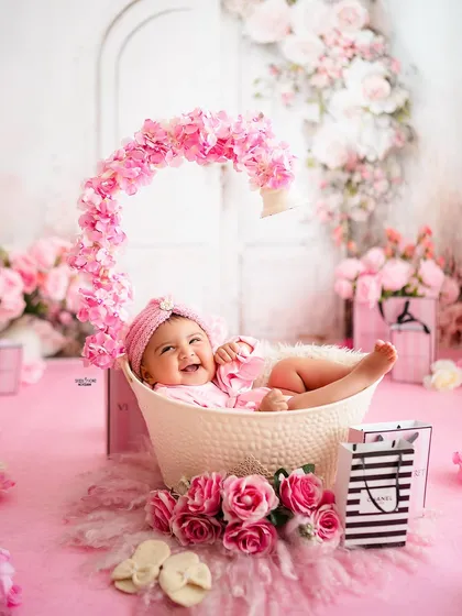 Having a blast in her floral bathtub! This baby's joyful expression is priceless.