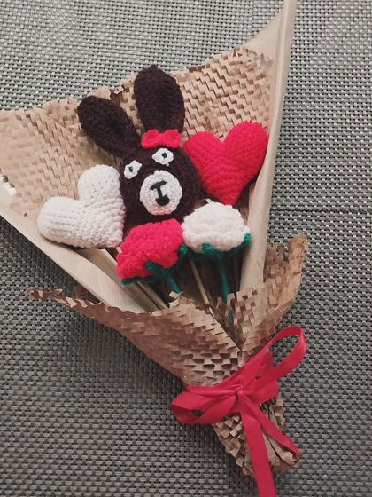 A truly unique custom bouquet I made for a client, featuring a teddy bear face, hearts, and roses. If you have a special idea for a bouquet, I would love to bring it to life.