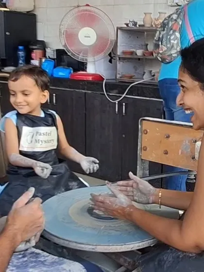 This smile says it all. There's nothing like the feeling of clay spinning under your hands for the first time. I make sure every child feels the magic of the potter's wheel in a fun and supportive way.