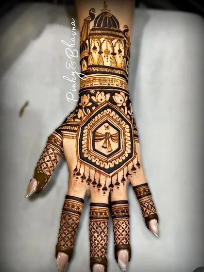 A striking back hand design with a bold hexagonal frame. The Swastik symbol inside adds a touch of tradition and good fortune.