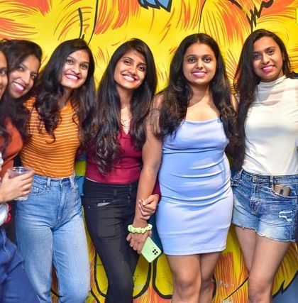 The ladies of Boomrang, all smiles and ready to dance the night away.