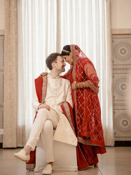 Foreheads touching in a moment of quiet connection during a Nikah ceremony. We capture the grace and profound love of Muslim weddings with the respect and artistry they deserve.