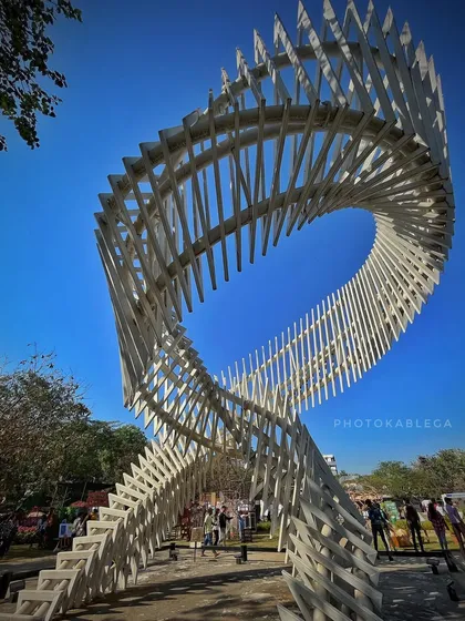 Beyond traditional festivals, I cover the artistic pulse of the city. This shot from the Kala Ghoda Arts Festival highlights a stunning architectural sculpture, showing my versatility in covering diverse cultural events.