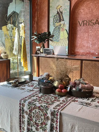 The beautifully decorated reception of Vrisa, a store known for its hand-embroidered pieces. The aesthetic of a store often reflects the beauty of its collection.