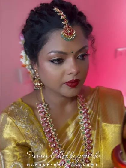I take great pride in perfectly matching foundation for all skin tones, especially for dusky skin. This look for the beautiful Swati showcases a warm, glowing complexion with defined eyes and a bold red lip, proving that the right shades enhance natural beauty.