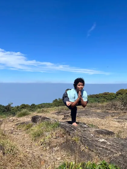 A balancing pose on a mountaintop. This picture is a symbol of my journey, finding stability and peace after a period of struggle. It was all worth it.