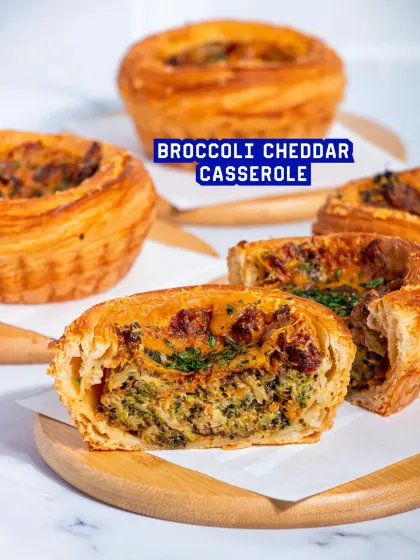 The Broccoli Cheddar Casserole is comfort food in a pastry. This hearty, savoury bake is filled with a creamy broccoli and cheddar mixture, perfect for a grab-and-go meal.