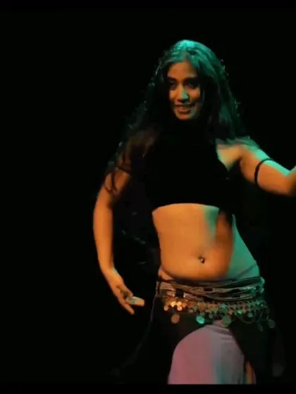 A solo performer in a purple costume, inviting absolute beginners to join our new belly dance batch in Koramangala.