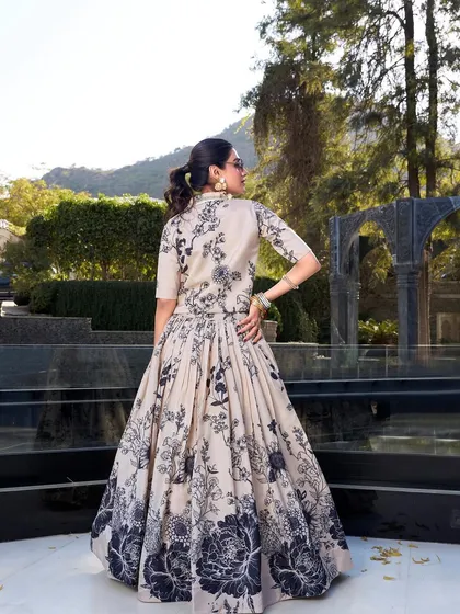 For a modern vibe with a traditional touch, I created this Tussar silk floral print lehenga. The jacket gives it a chic, Indo-Western feel, perfect for a brunch or a destination wedding event. It's elegance with a bit of an edge.