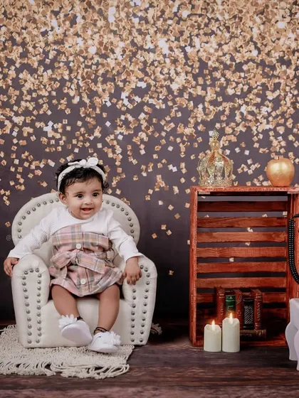 A wider view of the glitter-themed set, showing the vintage-inspired props like wooden crates and a rotary phone that add a rustic charm to the glamour.