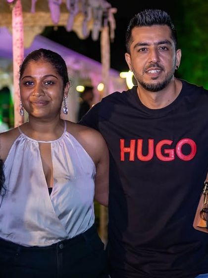 Guests mingling at the outdoor Polo event, showcasing the beautiful and exclusive setting.