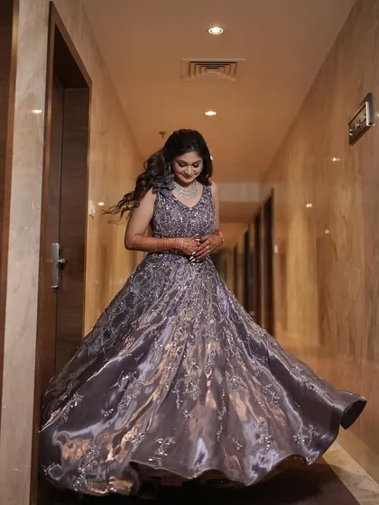 A full-length shot of the dreamy lavender cocktail gown. The soft glam makeup with mauve shimmer lids perfectly complements the romantic feel of the dress.