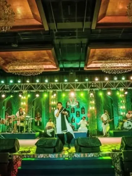 The full band on a beautifully decorated stage, ready to create a magical night.